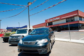 The showroom at Ed Corley's Dodge dealership has been closed and the lot converted into a space for used cars. © 2011 Gallup Independent / Cable Hoover